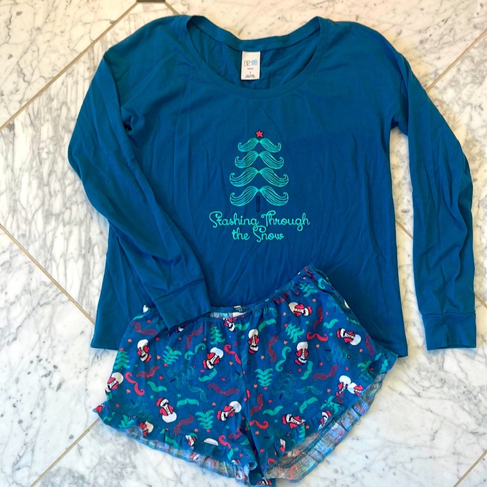 Stashing through the snow pajama set. Shorts with snowman with mustaches. Size S